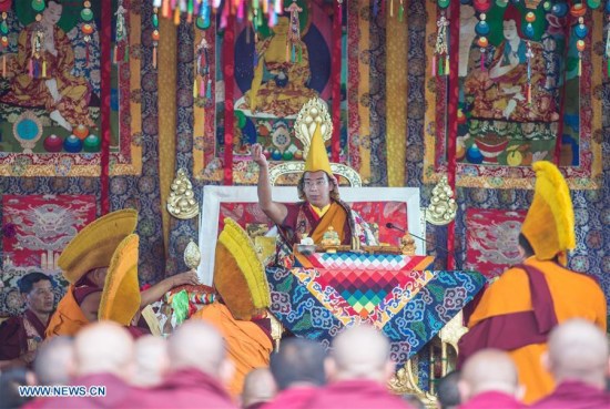 The 11th Panchen Lama Bainqen Erdini Qoigyijabu delivers a sermon during the Kalachakra ritual in Xigaze, southwest China's Tibet Autonomous Region, July 21, 2016. (Xinhua/Purbu Zhaxi)  