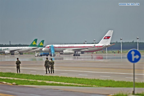 Photo taken on July 22, 2016 shows an Air Koryo passenger plane (R) that has made a forced landing at Taoxian International Airport in Shenyang, capital of northeast China's Liaoning Province. 