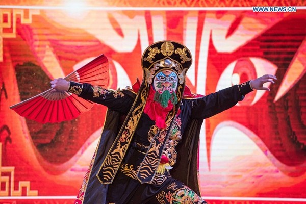 A Chinese artist performs mask-changing dance during the China Day of the 1st Afro-Chinese Arts and Folklore Festival, in Cairo, Egypt, July 22, 2016. Performances on China Day, the second day of the 1st Afro-Chinese Arts and Folklore Festival, have attracted many Egyptian, Chinese and African audiences at Egypt's Opera House in downtown Cairo on Friday. (Xinhua/Meng Tao) 