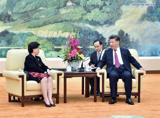 Chinese President Xi Jinping (R) meets with Director-General of the World Health Organization Margaret Chan (L) at the Great Hall of the People in Beijing, capital of China, July 25, 2016. (Xinhua/Li Tao)