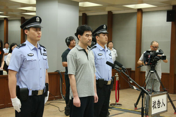 Sun Xin, previously one of China's most-wanted economic fugitives, stands trial at Beijing No 2 Intermediate People's Court on July 26, 2016. (Photo/provided to chinadaily.com.cn)