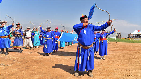 A Naadam festival in the Inner Mongolia autonomous region gathers participants from different regions who showcase their archery art and eyecatching costumes; and wrestlers compete for strength and courage and young musicians play matouqin, or horseheaded fiddle. Photos Provided To China Daily