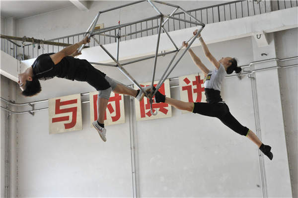 Performers rehearse for China Goes Pop!, the latest production by Shandong Acrobatic Troupe.