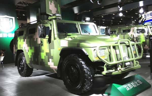 A vehicle-mounted sonic weapon system is on display at the Second China Military and Civilian Integration Expo in Beijing on Monday. (Photo by Zhao Lei/chinadaily.com.cn)