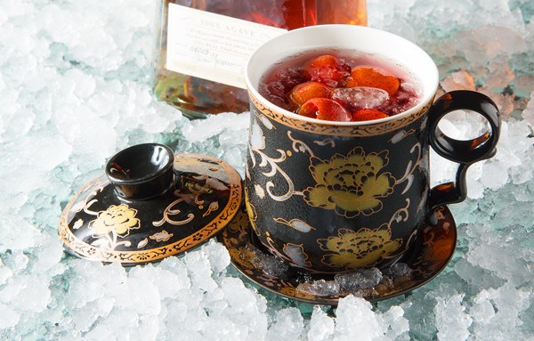 This cocktail, called "The Forbidden City" and created by Attila Balint, the managing bartender at the China World Summit Wing, features tequila, hawthorn, red berries and brown sugar. (Photo provided to chinadaily.com.cn)