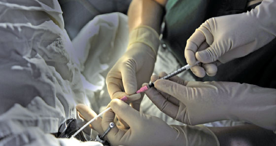 Doctors transplant an embryo into a woman's uterus at the Center for Reproductive Medicine at Tangdu Hospital in 2011. Provided To China Daily