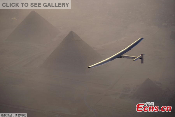 Solar Impulse 2, the solar powered plane, piloted by Swiss pioneer Andre Borschberg is seen during the flyover of the pyramids of Giza on July 13, 2016 prior to the landing in Cairo, Egypt in this photo released on July 13, 2016.(Photo/Agencies)
