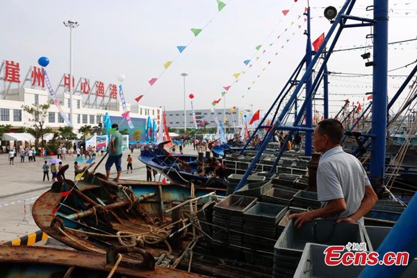 Opening ceremony of the Yazhou Central Fishing Port, 50 kilometers west of Sanya City, South Chinas Hainan Province, Aug. 1, 2016. The fishing port aims to be the largest, best-equipped and multifunctional port on the island province. (Photo/China News Service)
