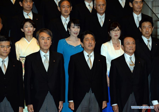 Japanese Prime Minister Shinzo Abe (2nd R, Front) and cabinet ministers pose during a photo session at Abe's official residence in Tokyo, capital of Japan, on Aug. 3, 2016. (Xinhua/Ma Ping)