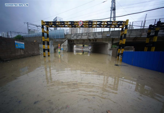 Photo taken on Aug. 3, 2016 shows a waterlogged railway culvert after torrential rain hit Nanning, capital of south China's Guangxi Zhuang Autonomous Region. Typhoon Nida resulted in torrential rain here on Wednesday. (Xinhua/Zhou Hua)