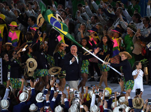 The delegation of Brazil parade into Maracana Stadium during the opening ceremony of the 2016 Rio Olympic Games in Rio de Janeiro, Brazil, Aug. 5, 2016. (Xinhua/Li Ga)