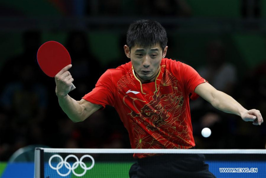 Zhang Jike of China competes during the men's single round 3 of table tennis against Chen Chien-An of Chinese Taipei at the 2016 Rio Olympic Games in Rio de Janeiro, Brazil, on Aug. 8, 2016. Zhang Jike won with 4:0. (Xinhua/Shen Bohan)