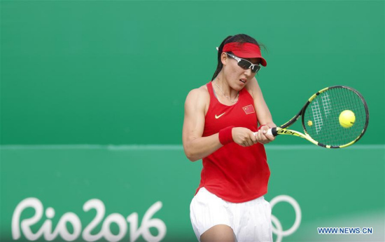 Zheng Saisai of China competes during the women's singles second round of tennis against Daria Kasatkina of Russia at the 2016 Rio Olympic Games in Rio de Janeiro, Brazil, on Aug. 8, 2016. Daria Kasatkina won Zheng Saisai with 2:0. (Xinhua/Han Yan)