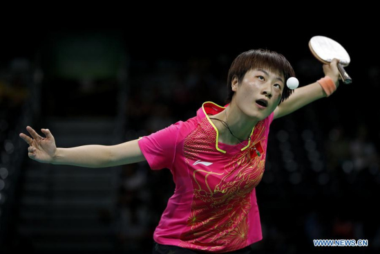 Ding Ning of China competes during the women's singles quarterfinal of table tennis between Ding Ning of Chian and Han Ying of Germany at the 2016 Rio Olympic Games in Rio de Janeiro, Brazil, on Aug. 9, 2016. Ding Ning won Han Ying with 4:0.Xinhua/Shen Bohan