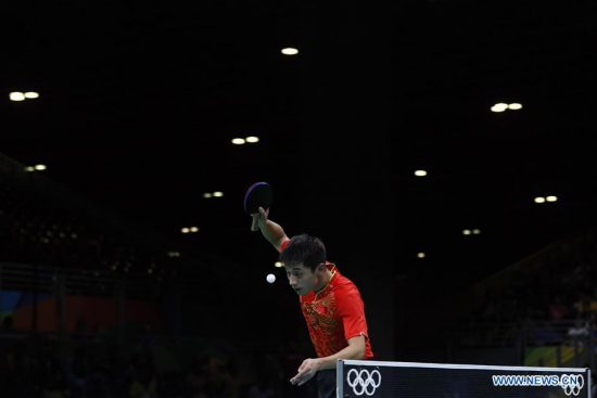 Zhang Jike of China competes during a men's singles quarterfinal match of table tennis against Koki Niwa of Japan at the 2016 Rio Olympic Games in Rio de Janeiro, Brazil, on Aug. 9, 2016. Zhang Jike won 4-1. (Xinhua/Shen Bohan)