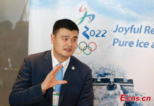 Former NBA star Yao Ming, acting as a promotion ambassador of the Beijing 2022 Winter Olympic Games, answers questions in a media interview in Kuala Lumpur, Malaysia, July 29, 2015. (Photo: China News Service/Du Yang)