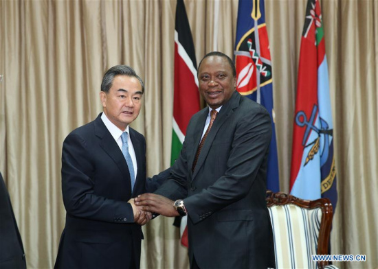 Kenyan President Uhuru Kenyatta (R) meets with Chinese Foreign Minister Wang Yi in Nairobi, Kenya, Aug. 10, 2016. (Xinhua/Pan Siwei)