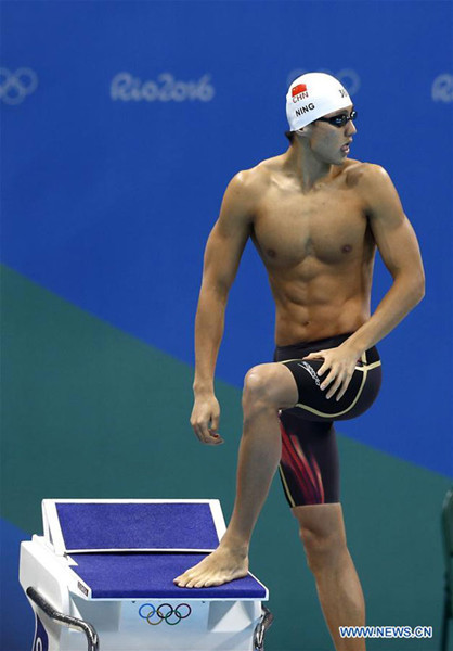  Ning Zetao taking part in the 50m free heats at the Rio Games. (Photo/Xinhua)