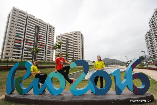 Members of the delegation of Egypt take a photo at the Olympic village in Rio de Janeiro, Brazil, on Aug. 2, 2016. (Photo/Xinhua)