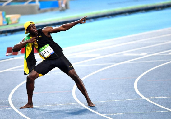 Usain Bolt ofJamaica celebrates after the final of men's 100m at the 2016 RioOlympic Games in Rio de Janeiro, Brazil, on Aug. 14, 2016. UsainBolt won the gold medal with 9.81. (Xinhua/Yan Yan)