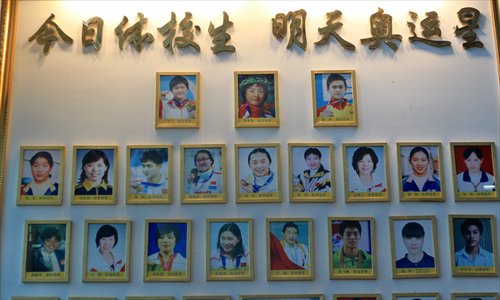  wall covered with pictures of medalists trained by the school. (Photo: Yang Hui/GT)