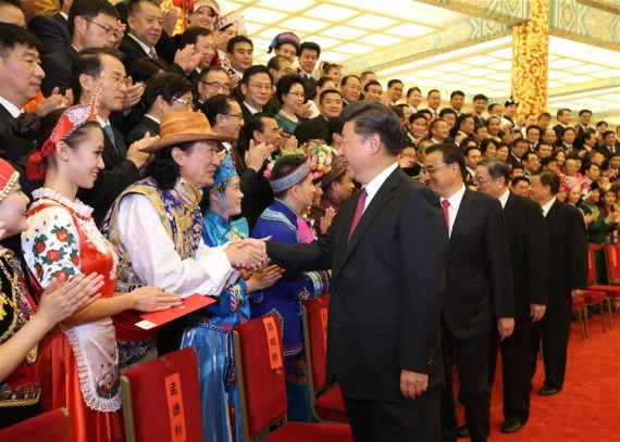 Chinese President Xi Jinping, Chinese Premier Li Keqiang, and Yu Zhengsheng, chairman of the National Committee of the Chinese People's Political Consultative Conference, Liu Yunshan, a member of the Standing Committee of the Political Bureau of the Communist Party of China Central Committee, meet with representatives of performers before an opening gala of the Fifth Minorities Art Festival in Beijing, capital of China, Aug. 18, 2016.  (Photo: Xinhua/Yao Dawei)