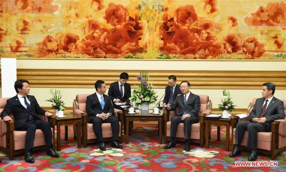 Chinese State Councilor Yang Jiechi (2nd R, front) meets with a delegation of young Japanese politicians led by Kiyohiko Toyama, a member of the New Komeito Party, in Beijing, capital of China, Aug. 23, 2016. (Photo: Xinhua/Rao Aimin)