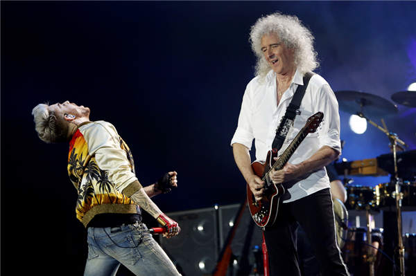 Original Queen member Brian May (right) is joined by singer Adam Lambert at the Queen and Adam Lambert concert in Barcelona earlier this year. Queen will debut on the Chinese mainland in September. (Photos provided to China Daily)