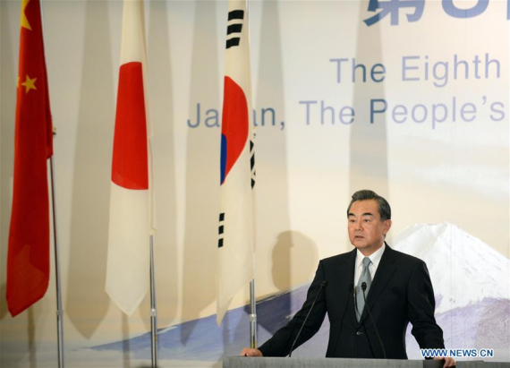 Chinese Foreign Minister Wang Yi speaks during a joint press conference in Tokyo, Japan, Aug. 24, 2016. The 8th trilateral foreign ministers' meeting was held here on Wednesday, with Chinese Foreign Minister Wang Yi, Japanese Foreign Minister Fumio Kishida and South Korean Foreign Minister Yun Byung Se attended. (Photo: Xinhua/Ma Ping)