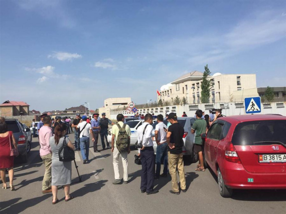 People gather near the explosion site in Bishkek, Kyrgyzstan, on Aug. 30, 2016. An explosion was heard in Bishkek on Tuesday, local media reported. (Xinhua/Chen Yao)