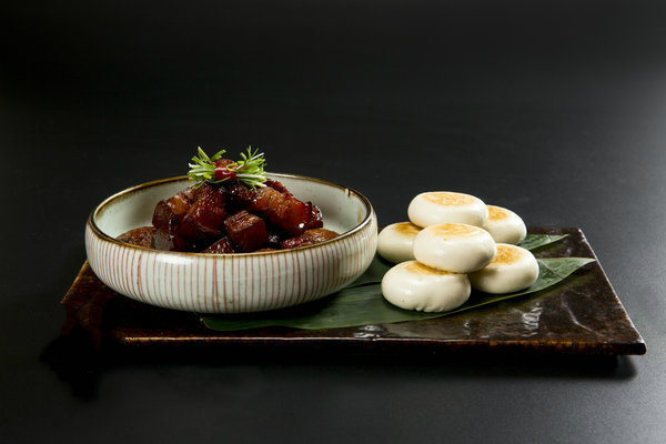 Pork braised in brown sauce, signature dishes of Zhangshengji. (Photo by Mike Peters/China Daily)