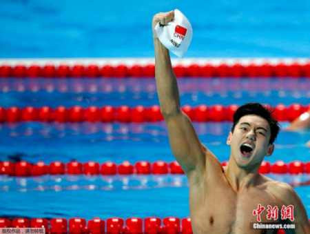 Rising Chinese swimming star Ning Zetao is one of the "national husbands" in China. (Photo Provided to China Daily)