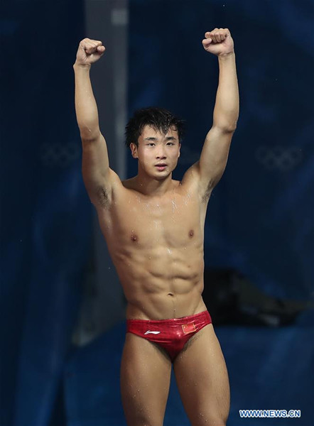 China's Cao Yuan celebrates after the men's 3m springboard final of Diving at the 2016 Rio Olympic Games in Rio de Janeiro, Brazil, on Aug. 16, 2016. Cao Yuan won the gold medal. (Xinhua/Cao Can)