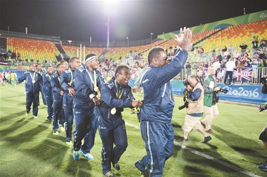 Fiji team with their gold medals during the medal ceremony for the Men's Rugby Sevens at Deodoro Stadium on August 11, 2016 in Rio de Janeiro, Brazil. (Photo/Xinhua)