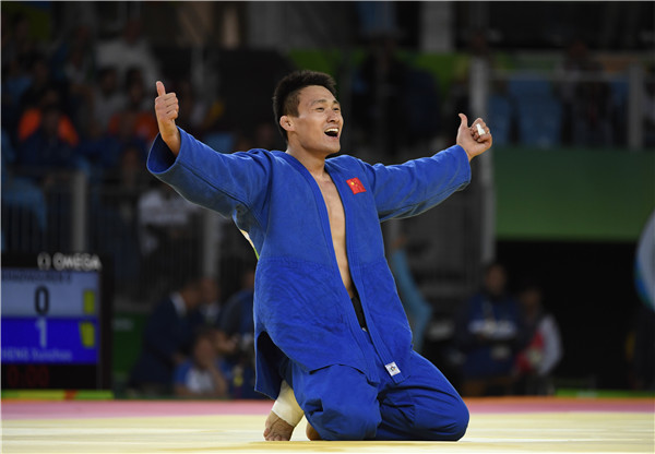 Cheng Xunzhao won bronze medal in men's 90kg judo class to mark the country's male judoist best Olympic performance.