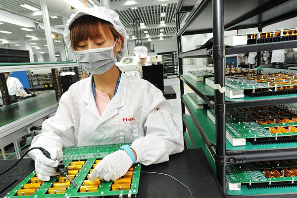 An employee of New H3C Group, a Hangzhou-based information technology solution provider, doing a soldering job. (Photo provided to China Daily)