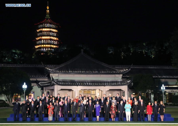Chinese President Xi Jinping and his wife Peng Liyuan pose for a group photo with heads of foreign delegations and their spouses before a banquet for the Group of 20 (G20) summit in Hangzhou, capital of east China's Zhejiang Province, Sept. 4, 2016. (Photo: Xinhua/Yao Dawei)