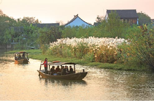 Situated in the western part of Hangzhou, about 5 km from West Lake, Xixi National Wetland Park is a rare urban wetland. (Photo by Qiu Guoqiang/Chen Shoucan/Raymond Zhou/China Daily)