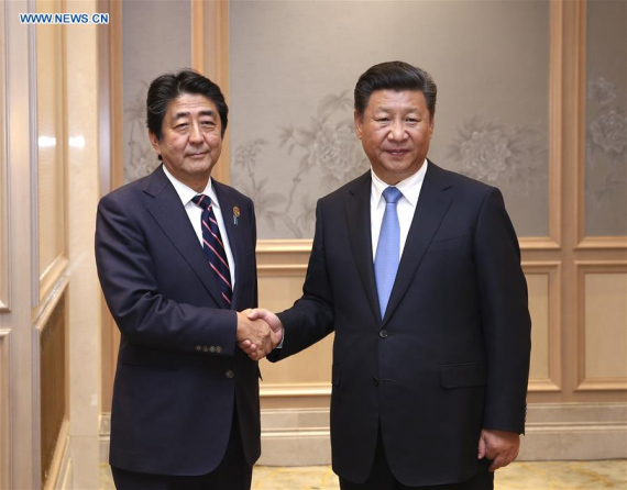 Chinese President Xi Jinping meets with Japanese Prime Minister Shinzo Abe, who is here to attend the Group of 20 (G20) summit, in Hangzhou, capital of east China's Zhejiang Province, Sept. 5, 2016. (Photo: Xinhua/Pang Xinglei)