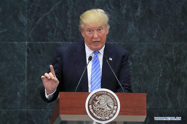 U.S. Republican presidential candidate Donald Trump addresses a joint press conference with Mexican President Enrique Pena Nieto (not seen in the picture) after their meeting in Mexico City, capital of Mexico, on Aug. 31, 2016. (Xinhua/Str)