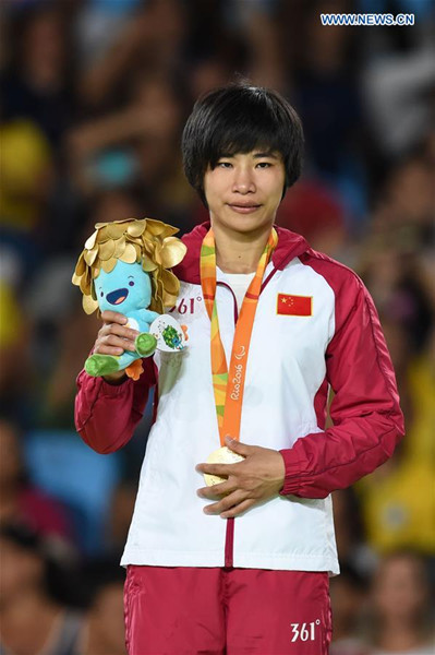 Li Liqing of China attends the medal presenting ceremony after the Women's Judo 48KG gold medal contest of Rio 2016 Paralympic Games in Rio de Janeiro, Brazil, on Sept. 8, 2016. Li Liqing won the gold. (Xinhua/Ou Dongqu)