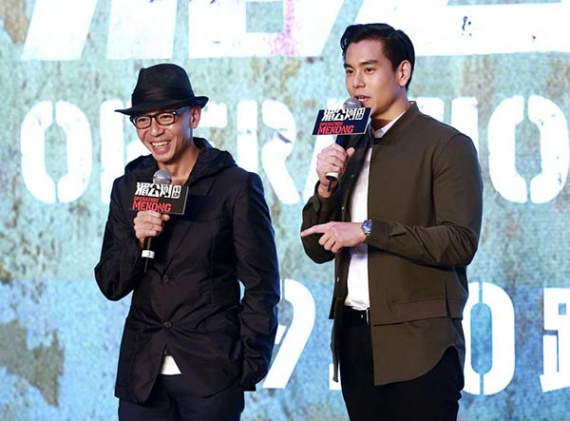 Dante Lam alongside the protagonist star Eddie Peng unveil the backdrops of Operation Mekong. (Photo by Feng Yongbin / China Daily)