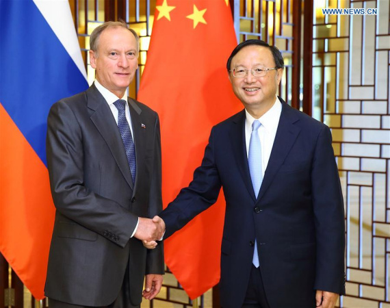 Chinese State Councilor Yang Jiechi (R) shakes hands with Secretary of Russia's Security Council Nikolai Patrushev, who is here to attend the 12th round of China-Russia strategic security consultation, in Beijing, capital of China, Sept. 12, 2016. (Photo: Xinhua/Ding Haitao)