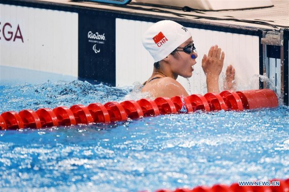 Li Guizhi of China reacts after the women's 50m freestyle S11 final of swimming event at the 2016 Rio Paralympic Games in Rio de Janeiro, Brazil, Sept. 12, 2016. Li claimed the title and broke the world record. (Photo: Xinhua/Ou Dongqu)