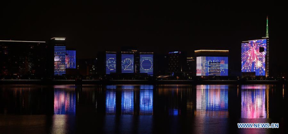  Photo taken on Aug. 31, 2016 shows a LED light show along the Qiantang River in Hangzhou, capital of east China's Zhejiang Province. The 11th G20 summit was held in Hangzhou from Sept. 4 to 5. (Photo: Xinhua/Jin Liwang)
