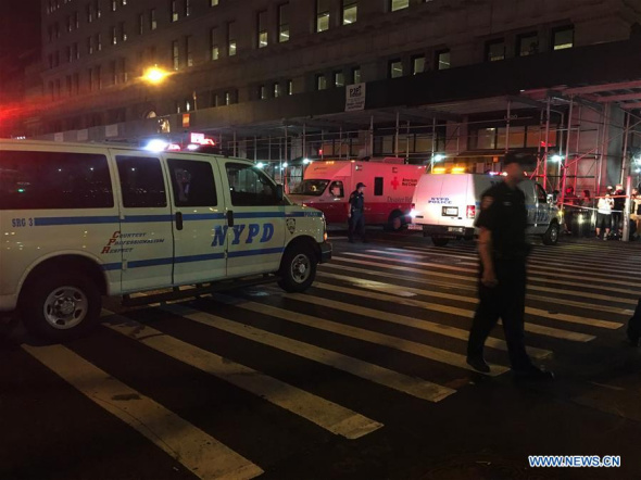This cellphone photo taken on Sept. 17, 2016 shows the police blocking a road after an explosion in New York, the United States. (Photo: Xinhua/Li Muzi)