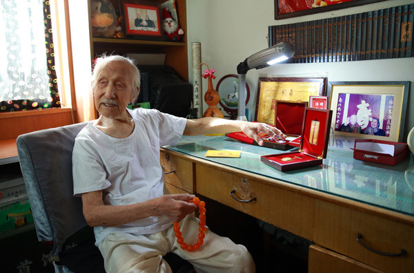 Nearly 112, Dong Jimin joined the Chinese resistance soon after the September 18th Incident in 1931. (Photo by ZOU HONG/CHINA DAILY)