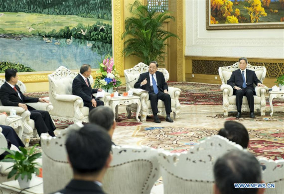 Yu Zhengsheng (2nd R, rear), chairman of the Chinese People's Political Consultative Conference (CPPCC) National Committee, meets with a delegation of county and city officials from Taiwan, in Beijing, capital of China, Sept. 18, 2016. (Photo:Xinhua/Wang Ye)