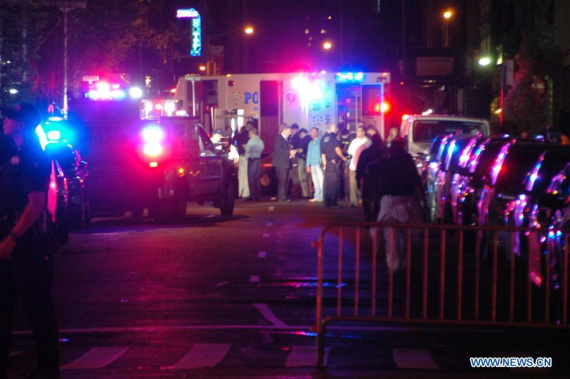 Policemen investigate near the site of an explosion in New York, the United States, Sept. 17, 2016.  (Photo: Xinhua/David Torres)
