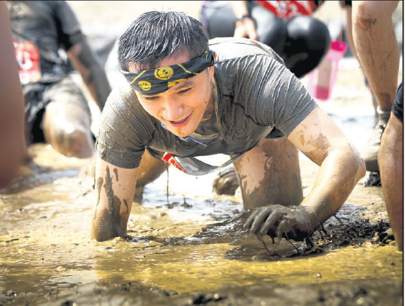 More than 4,000 running enthusiasts take part in the latest mud running event held in Shanghai on Aug 27 and Aug 28. Shanghai was the third stop on this year's nationwide mud run tour held by Beetle Sports. The sport originated in Britain and was brought to China in 2015 by Beetle Sports, a start-up that was established in the same year. (Provided to China Daily)